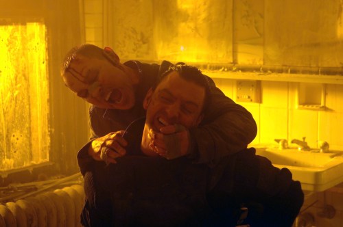 Doug Hutchison, rear, and Ray Stevenson in a scene from "Punisher: War Zone."