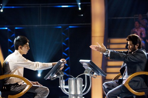 Dev Patel, left, does his best to field questions from Anil Kapoor in "Slumdog Millionaire," the 2008 winner of Oscar's best picture award. 