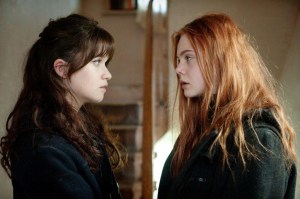 Alice Englert, left, and Elle Fanning star in the drama “Ginger & Rosa.”