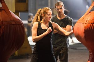 Shailene Woodley, left, and Theo James star in “Divergent.”  Photo courtesy of Lionsgate